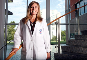 Sandy Billinger in lab coat photo